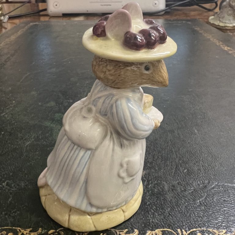 A Royal Doulton Mrs Apple figurine - South Perth Antiques & Collectables