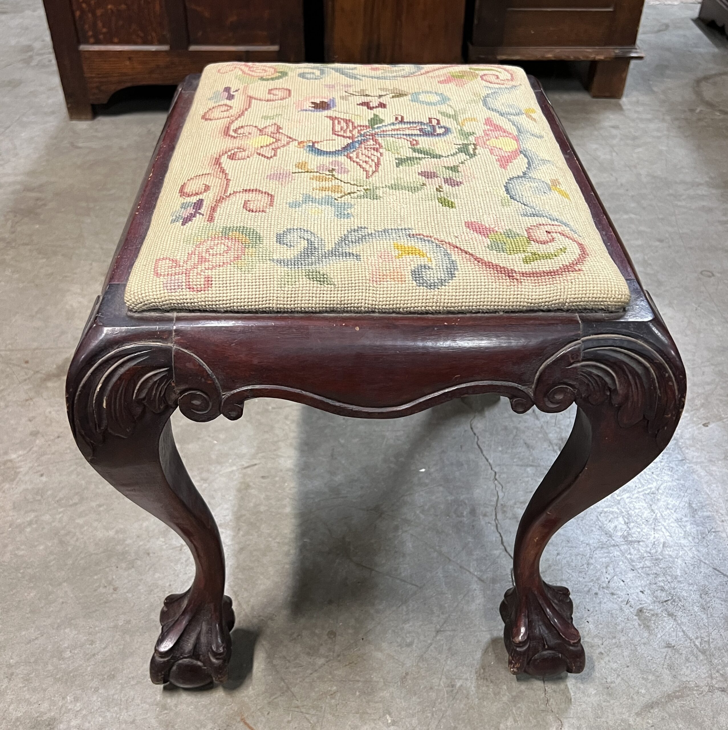 A foot stool with ball and claw feet - South Perth Antiques & Collectables
